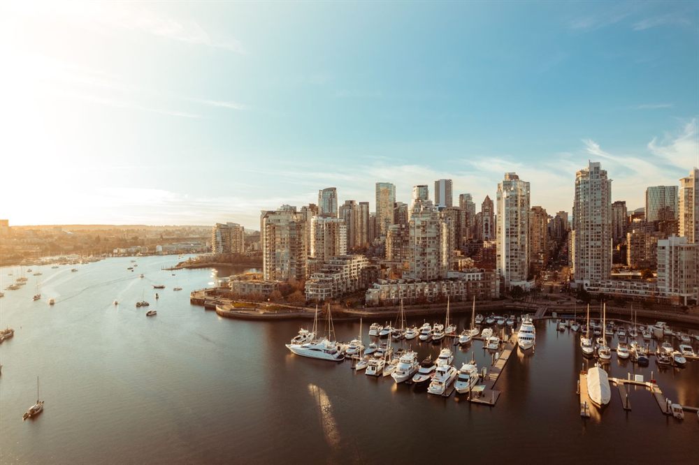 Vancouver skyline and marina at sunset, the starting point for Alaska cruise deals from Vancouver